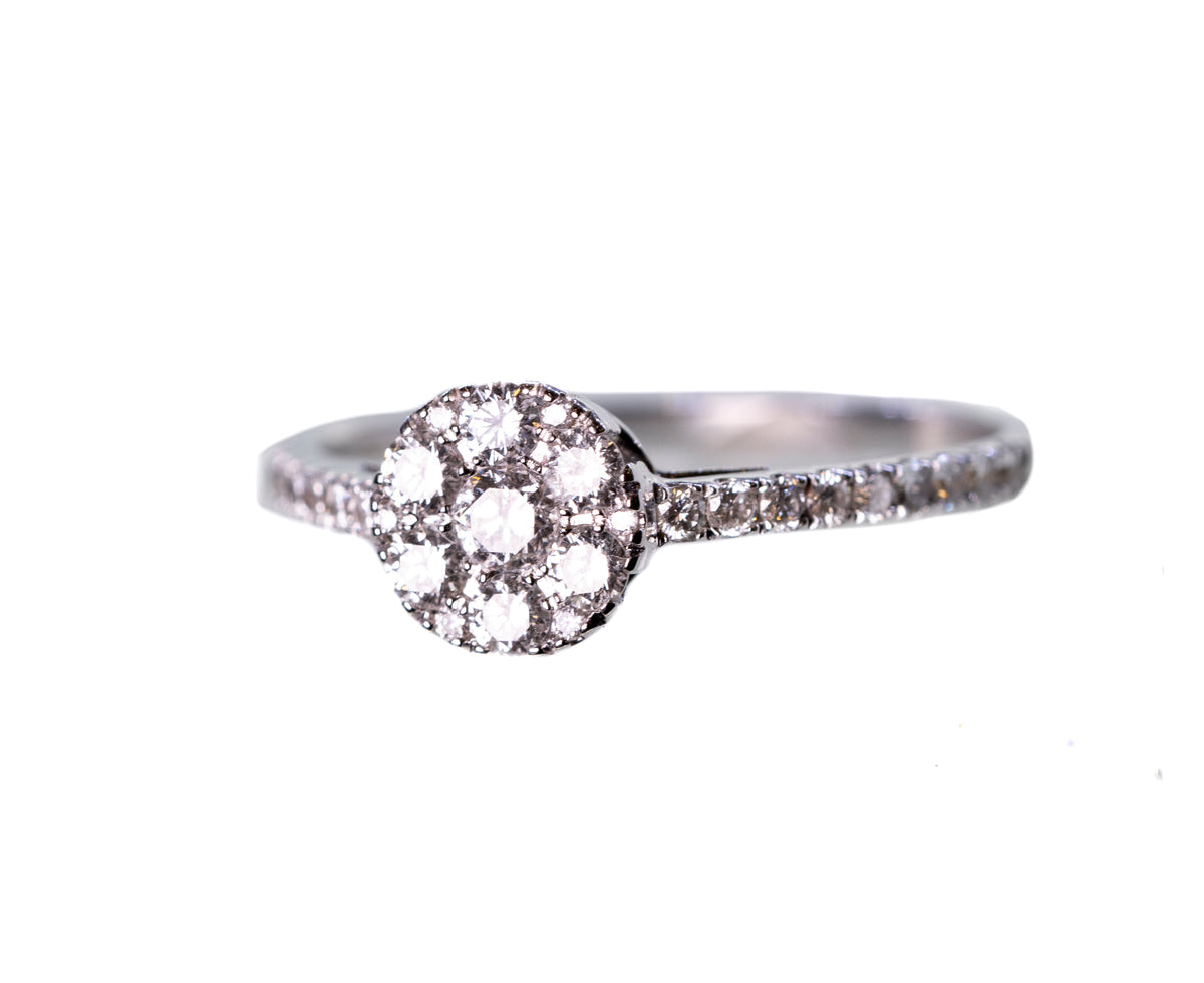 0.55ct Diamond Halo in 18ct White Gold Ring